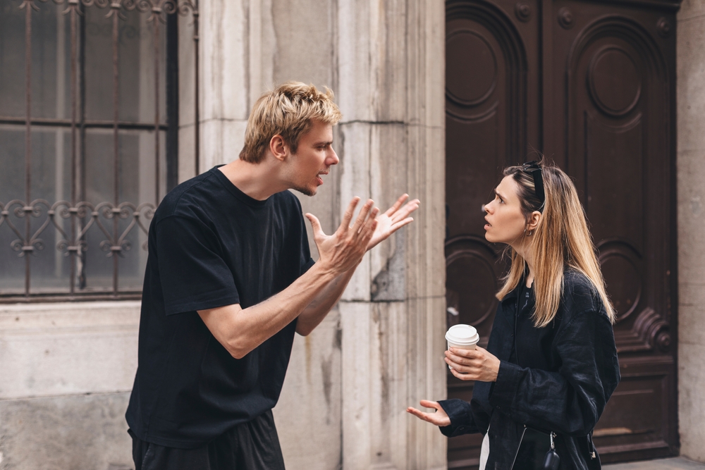 Photo of a Man Yelling at a Woman