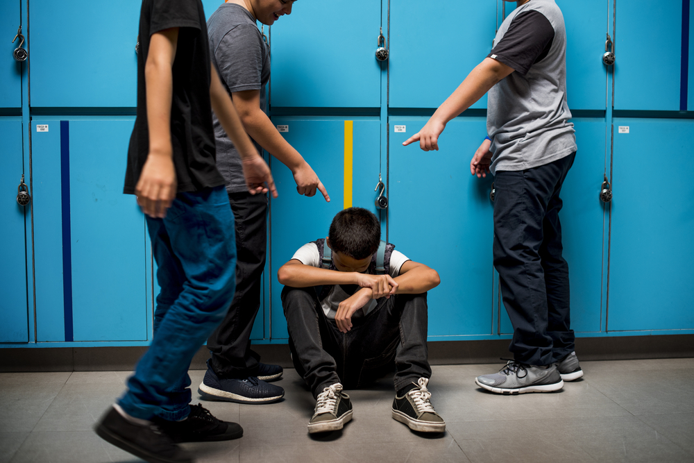 Photo of Boy Getting Bullied in School