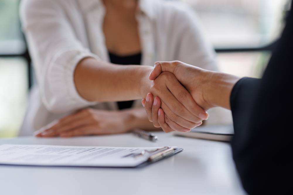 Photo of people shaking hands