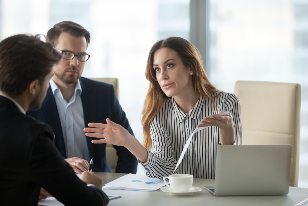 Dissatisfied executive manager having conflict with employee about financial report mistake, disgruntled clients claim complaint disputing about bad contract terms meeting lawyer, legal fraud concept